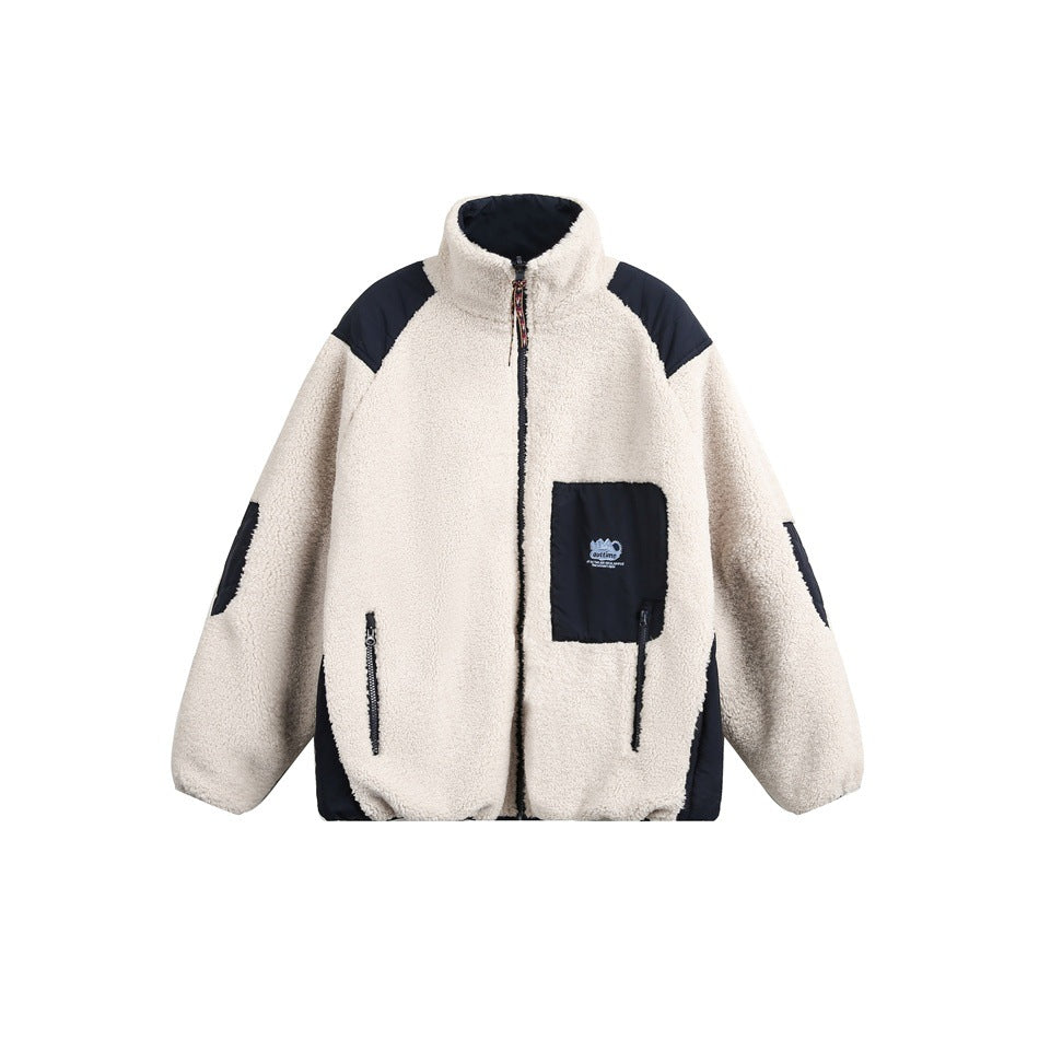 Off-white fleece-like zip jacket with navy shoulder panels, chest patch pocket and zippered pockets, front view