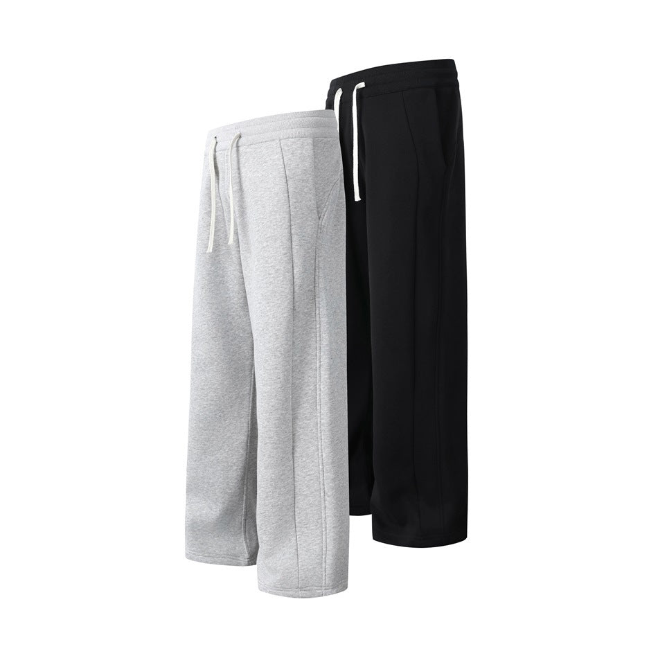Light gray and black wide-leg sweatpants shown together, each with a white drawstring waistband.