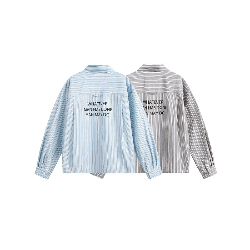 Two back-view striped shirts in pale blue and gray, each printed with the same black slogan.
