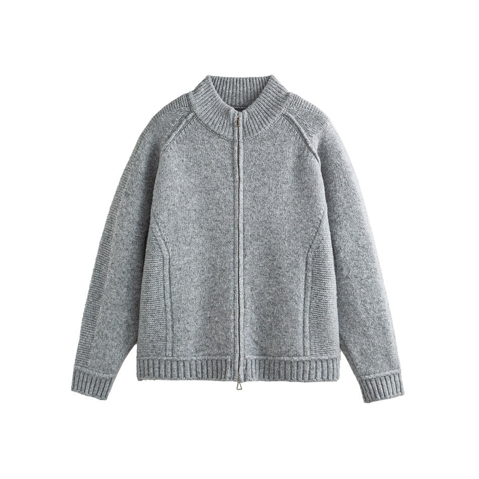 Light gray knit zip-up cardigan with ribbed stand collar, raglan sleeves and textured side panels, front view