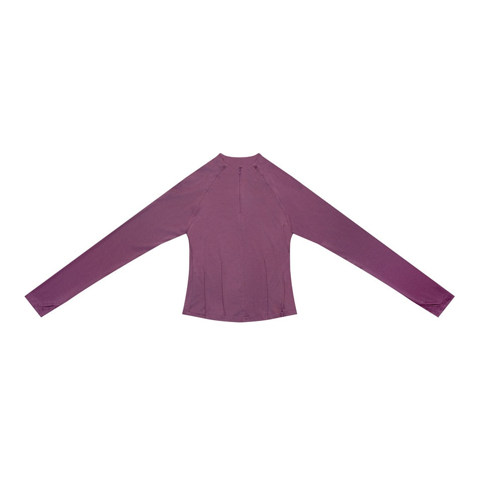 Purple long-sleeve half-zip top laid flat with raglan sleeves and thumbholes