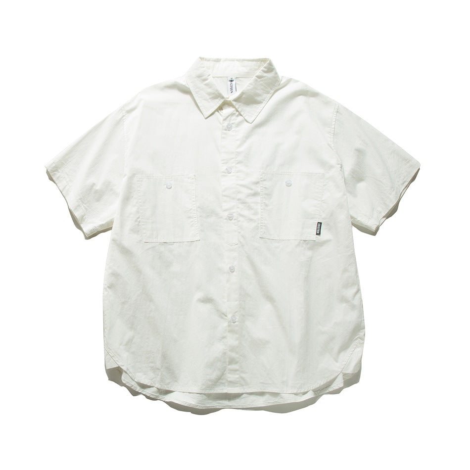 White short-sleeve button-front shirt with two chest patch pockets and a curved hem, laid flat