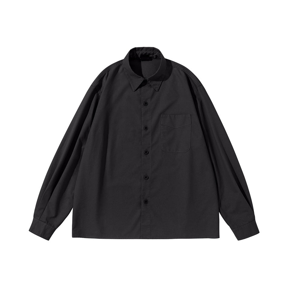 Black long-sleeve button-up shirt with pointed collar and chest pocket, flat lay front view