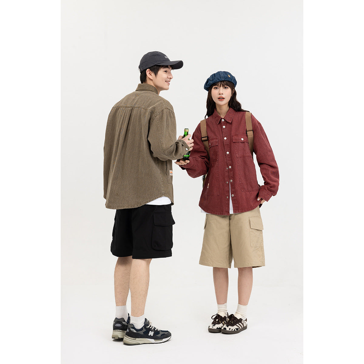 Two models show olive-brown and muted red pocket overshirts, one from the back and one from the front.