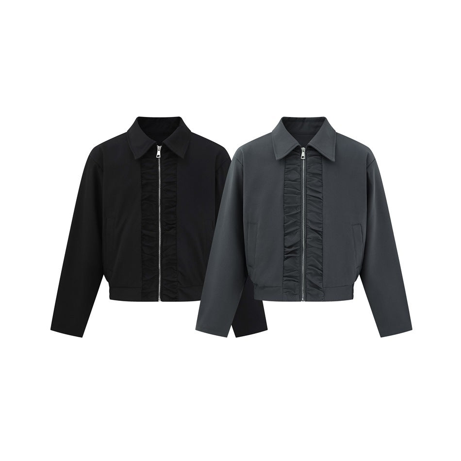 Two cropped jackets shown from the front in black and charcoal, with pointed collars and gathered zipper trim.