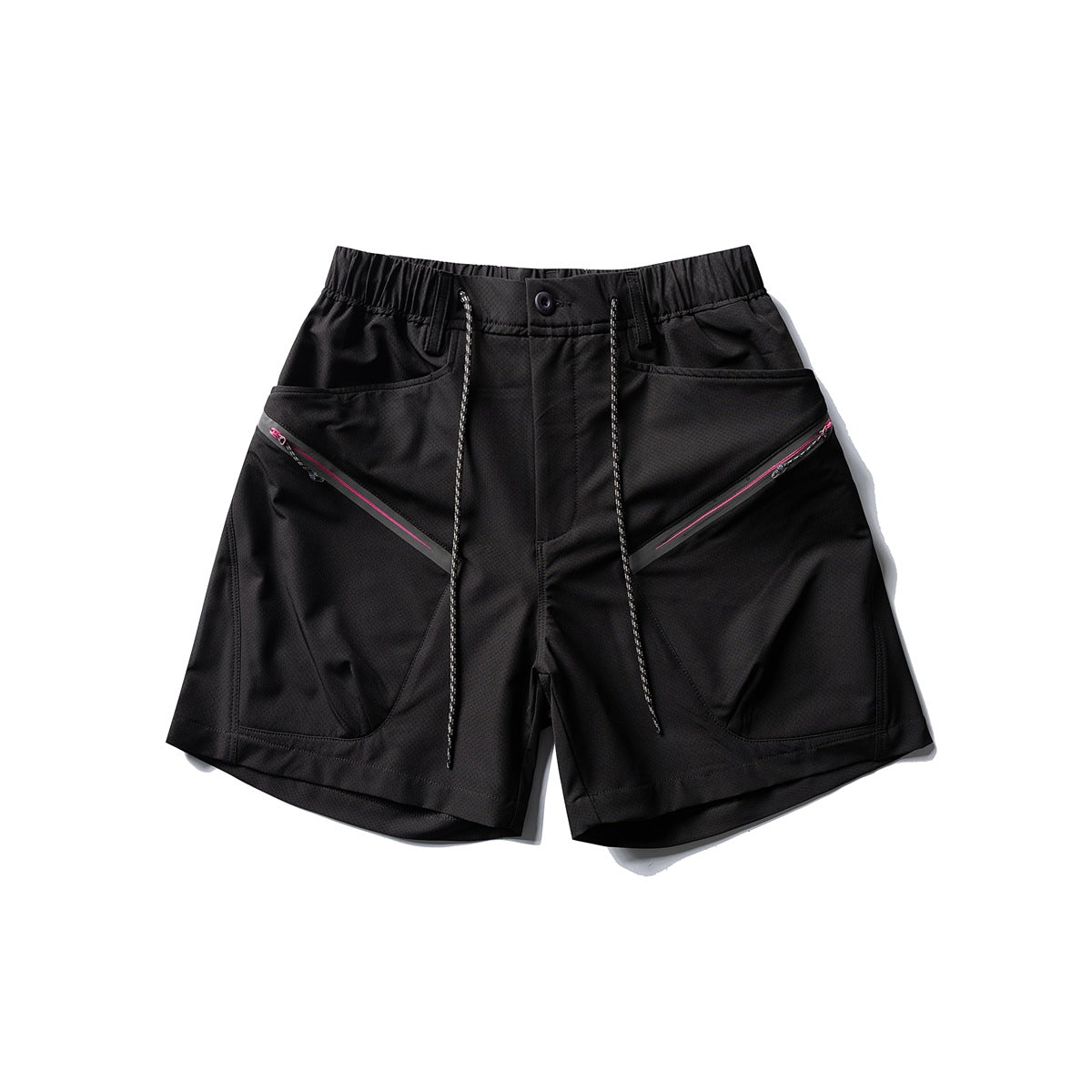 Black wide-leg shorts with elastic waist, drawcord and diagonal zipper front pockets with pink zipper trim, flat lay