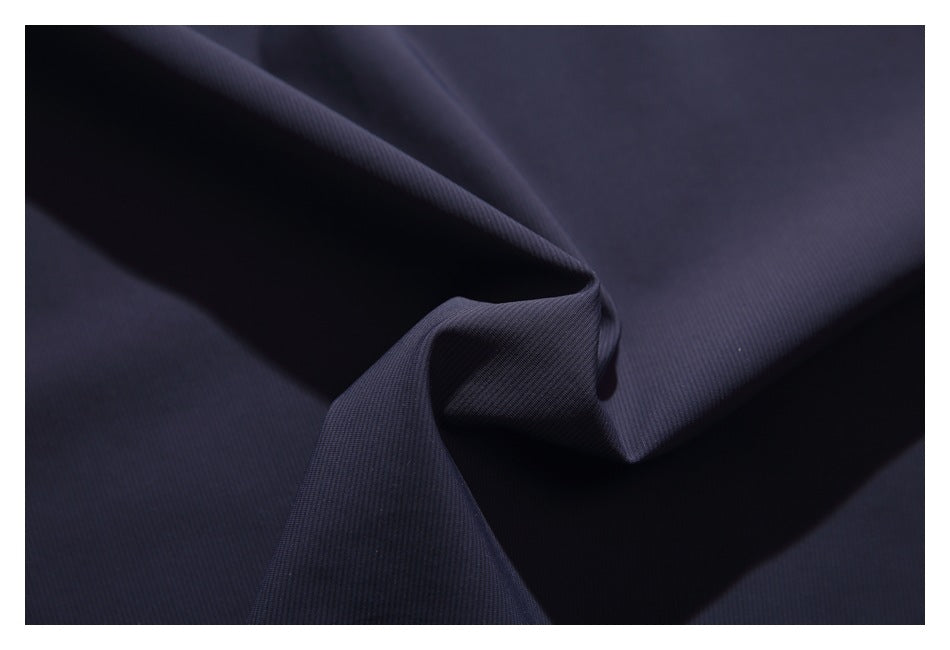 Close-up showing the fine texture and drape of dark navy fabric.
