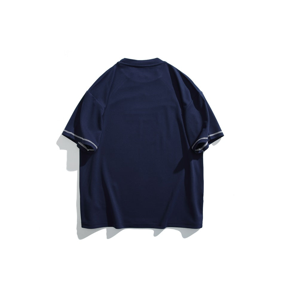 Back view of a plain navy short-sleeve T-shirt with light contrast stitching at the sleeve hems.