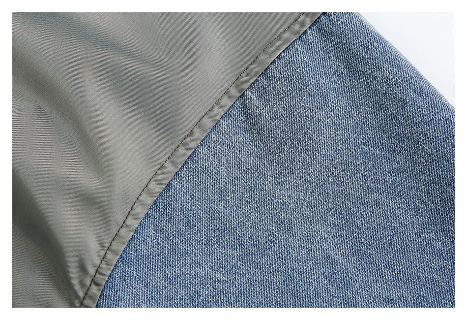 Close-up of a gray jacket panel beside a blue denim-textured sleeve section.