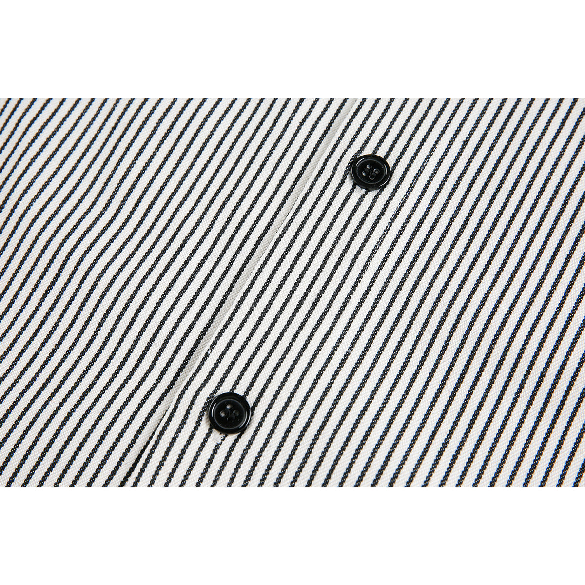Close-up of black buttons on white fabric with narrow black vertical stripes.