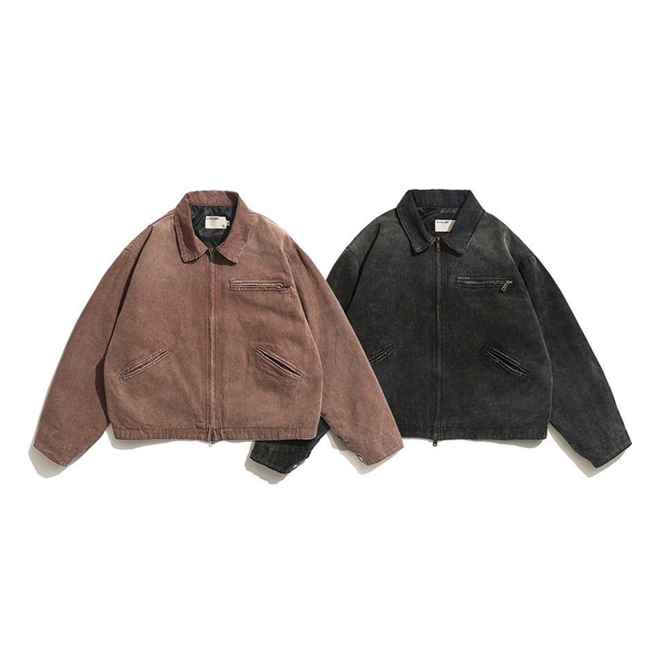 Two washed zip-front collared jackets side by side, one reddish brown and one faded black, flat lay