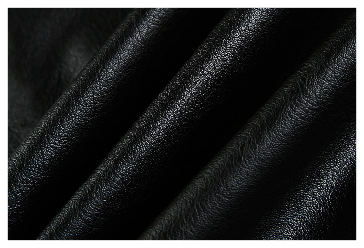 Close-up showing the textured black material draped into soft folds.