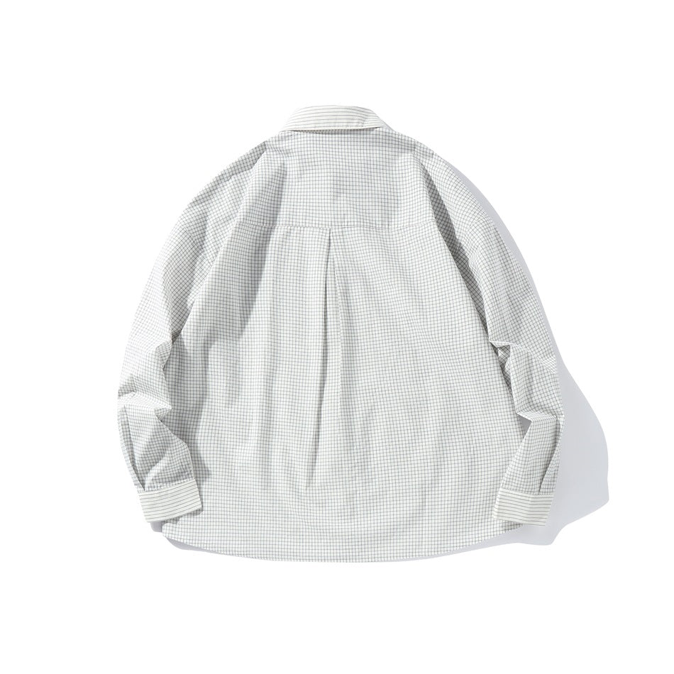 Back view of off-white grid-check long-sleeve shirt with center back pleat and striped cuffs, flat lay