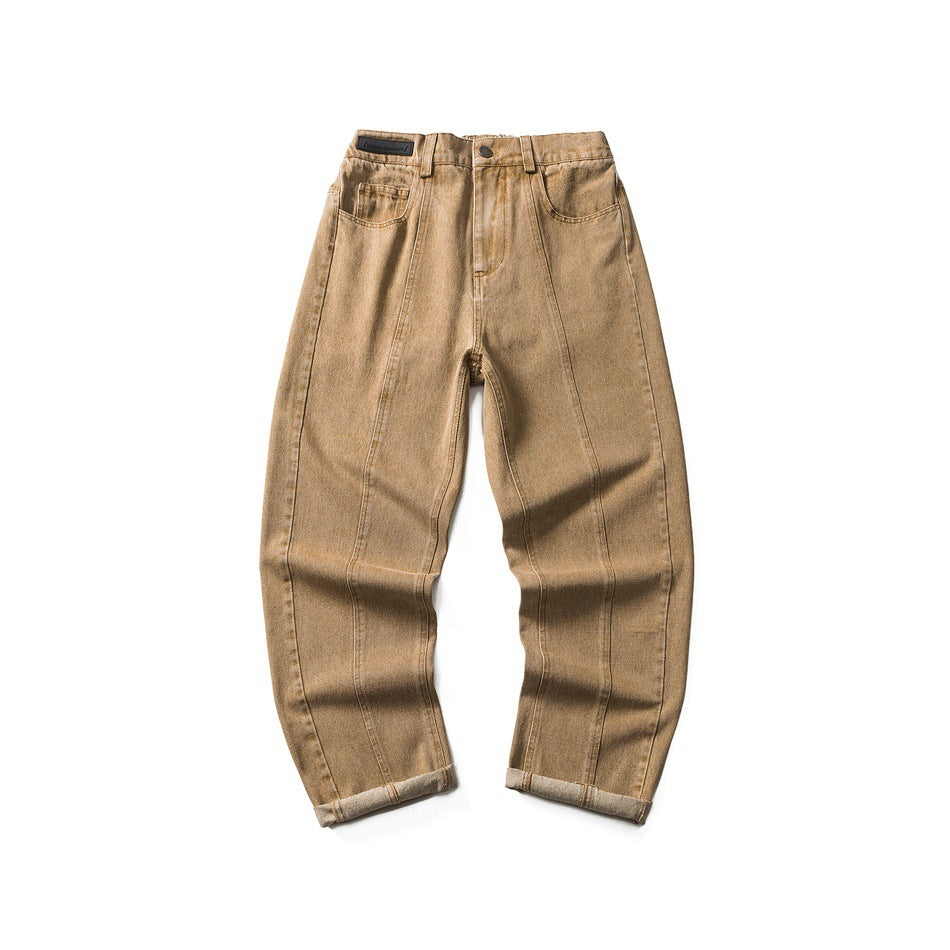 Front flat lay of khaki washed-denim relaxed jeans with cuffed hems and vertical leg seams