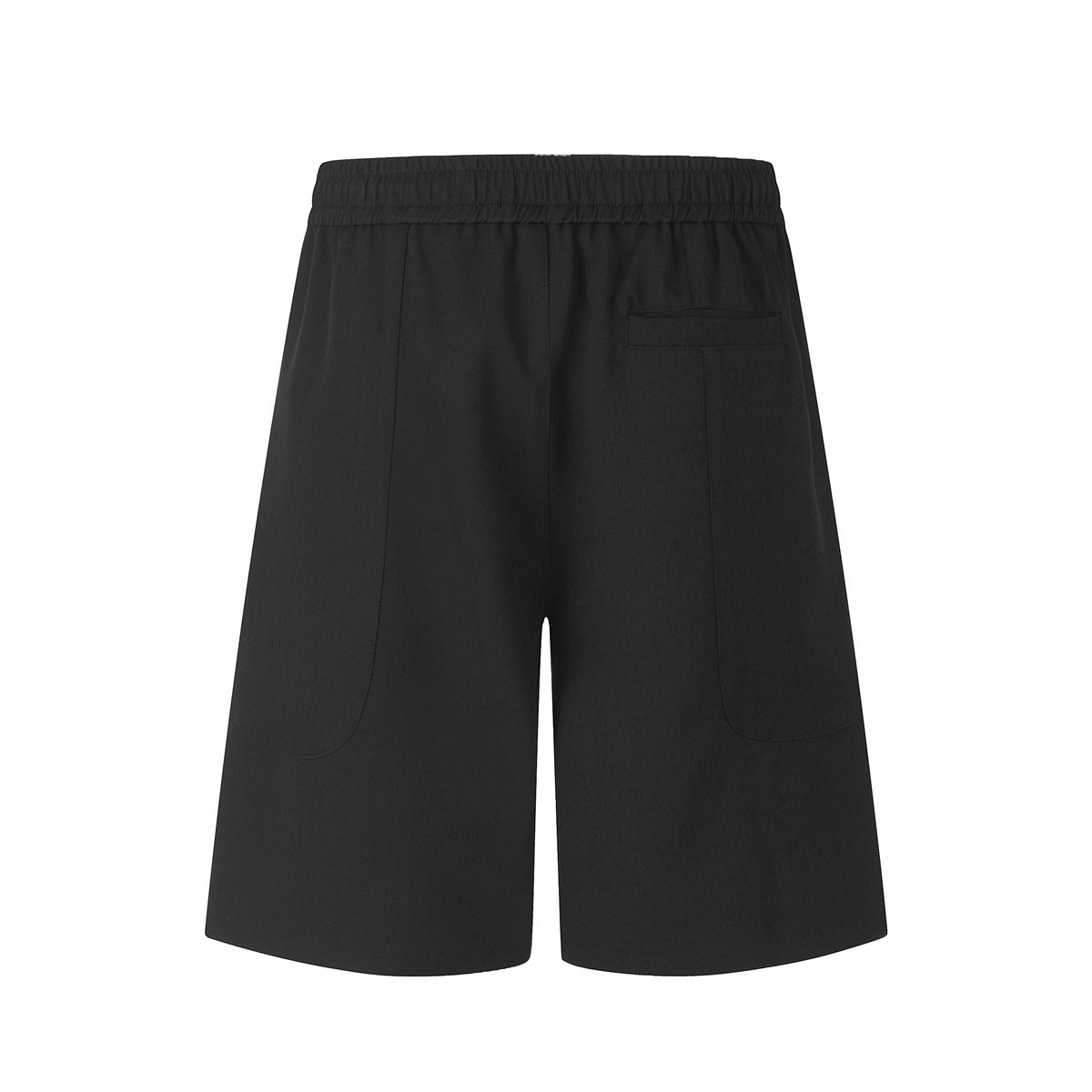 Back view of black shorts with an elastic waistband, curved side seams, and a small rear pocket.