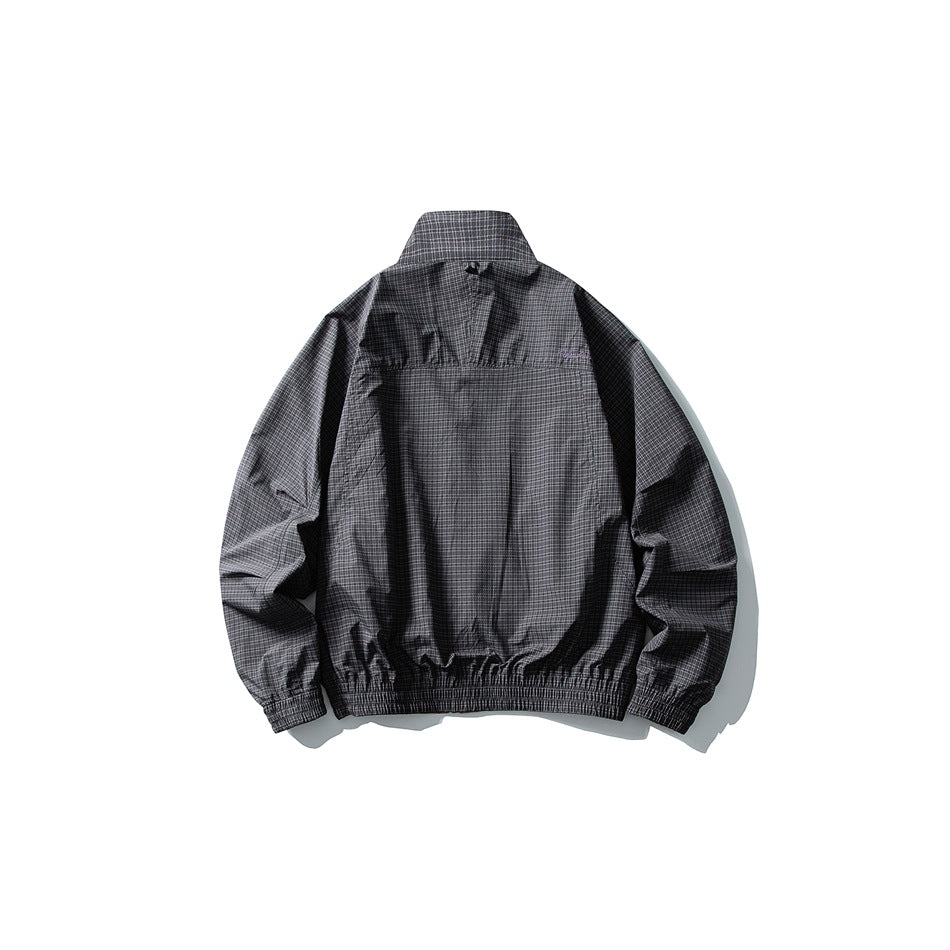 Charcoal fine-check jacket shown from the back, with a raised collar and elastic cuffs and hem.