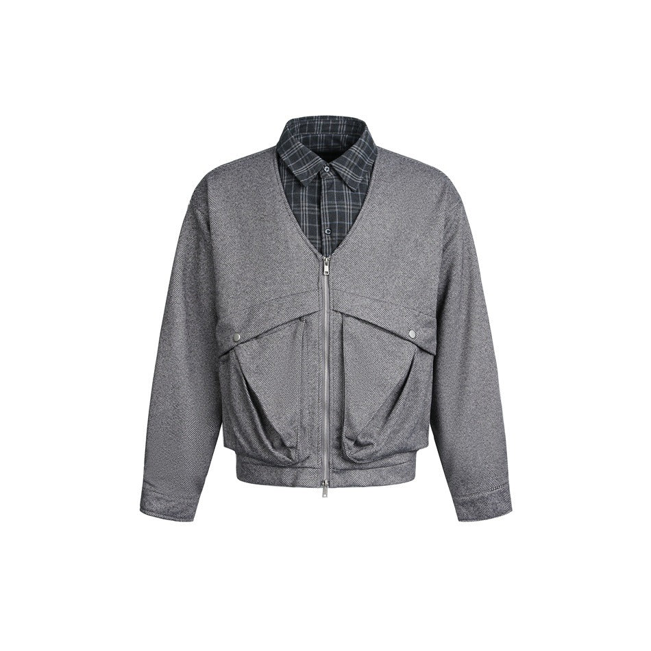 Gray herringbone zip-front jacket with plaid collar layer and two flap pockets, flat front view