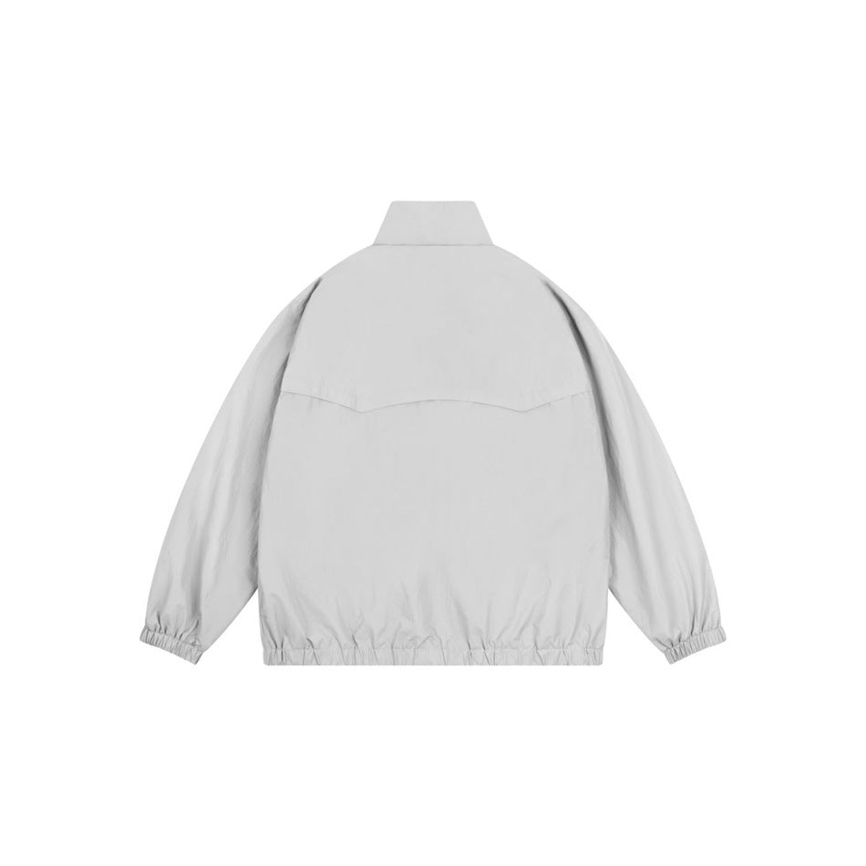 Gray jacket back view with curved yoke seam, stand collar, elastic cuffs and elastic hem