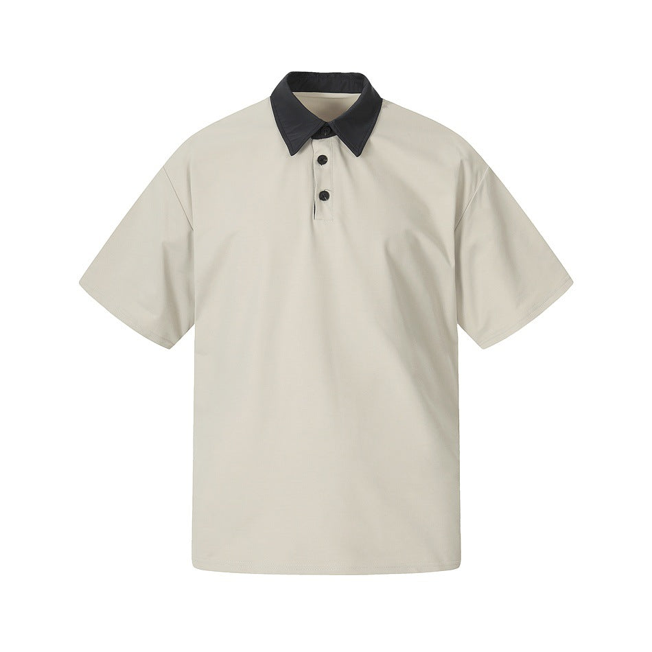 Light stone gray short-sleeve polo-style top with black contrast collar and two black buttons, flat front view