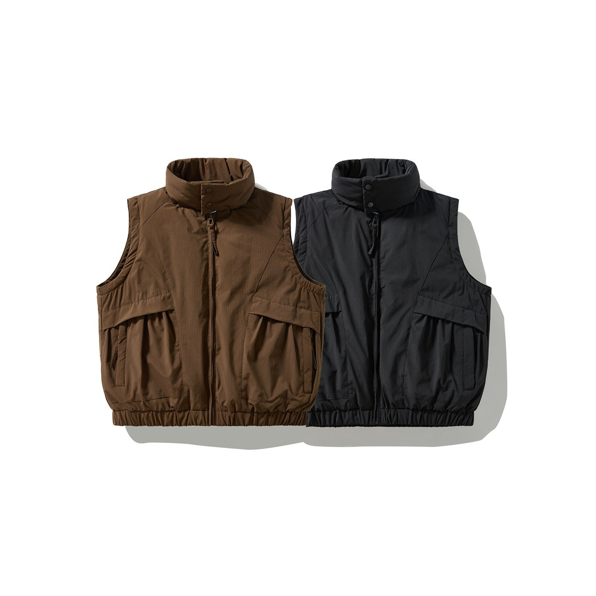 Brown and black sleeveless vests shown from the front, with stand collars, front zippers, and large flap pockets.
