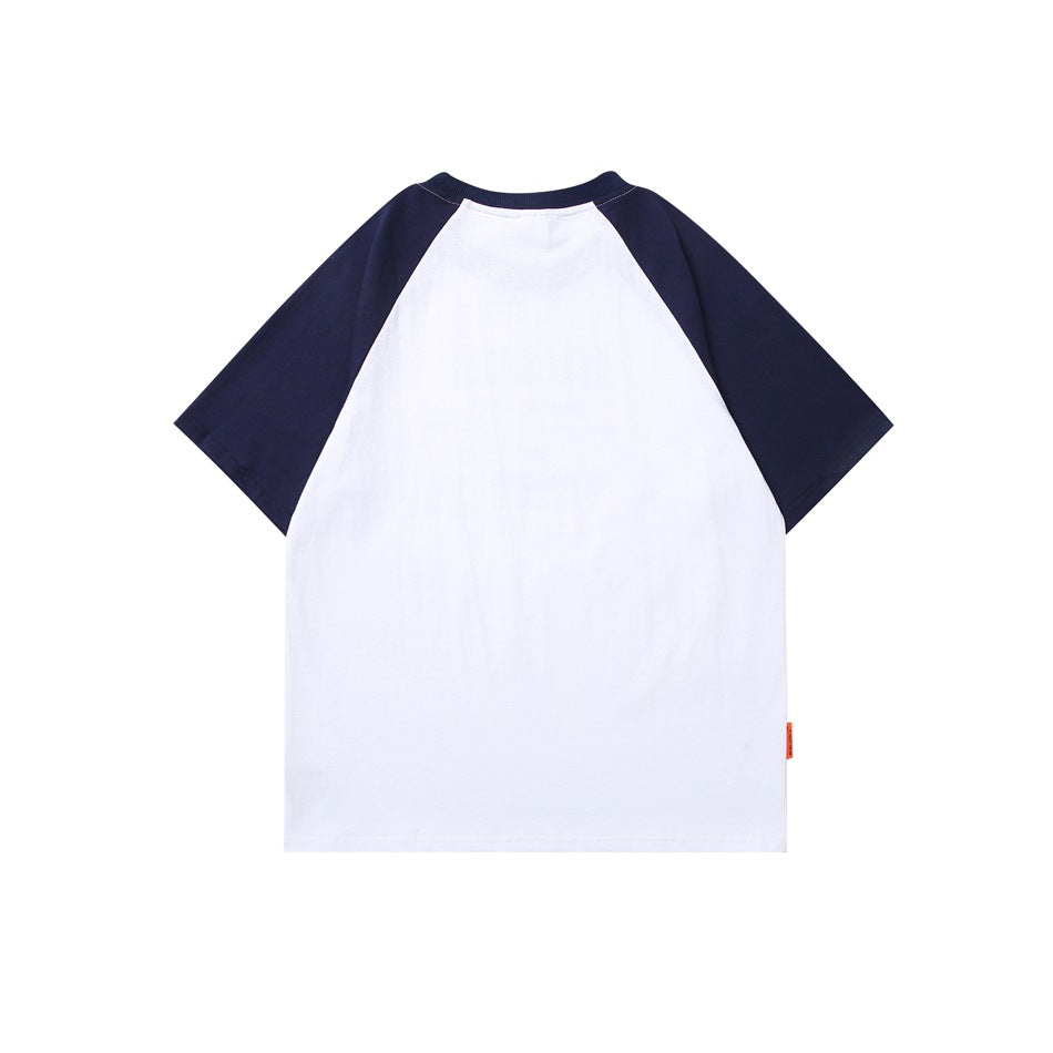 Back view of a white raglan T-shirt with navy sleeves and a navy ribbed collar.