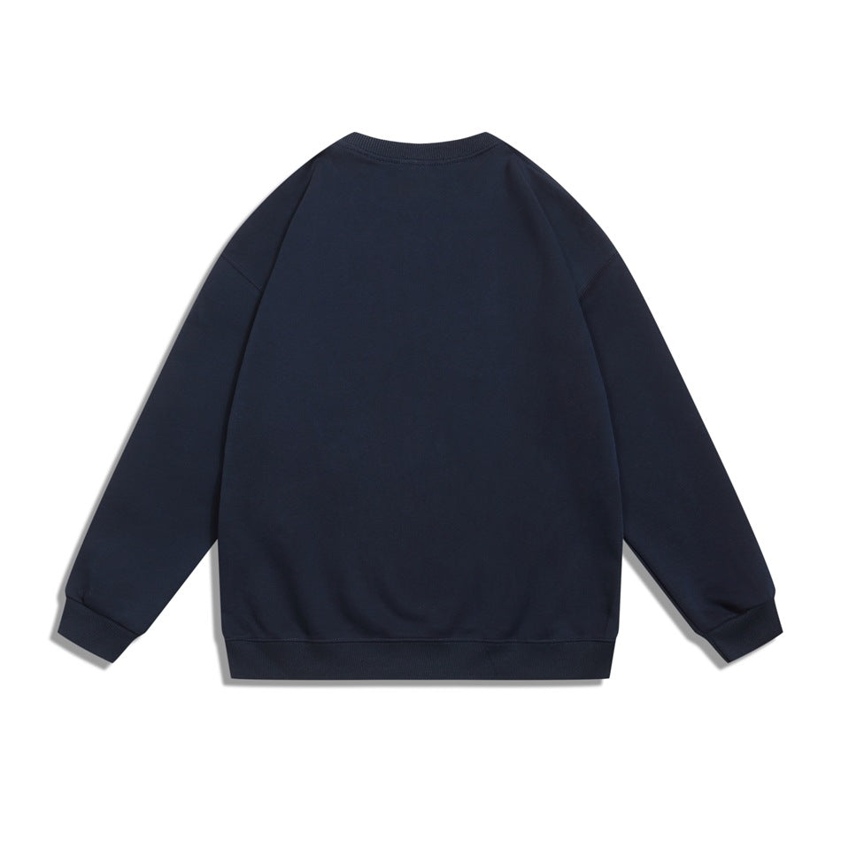 Back view of a plain dark navy crewneck sweatshirt with long sleeves and ribbed cuffs and hem.
