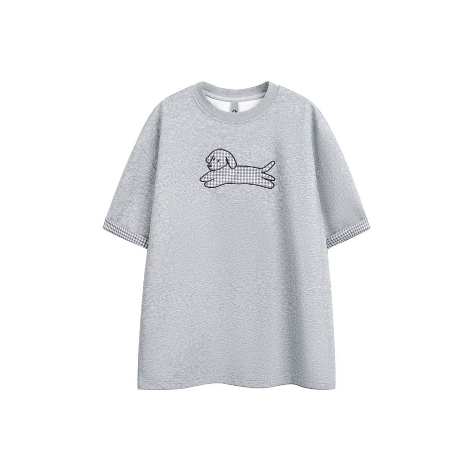 Front view of a heather-gray oversized short-sleeve crewneck tee with gingham sleeve cuffs and a dog graphic.