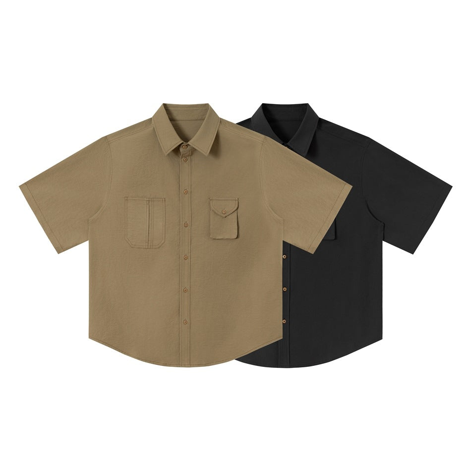 Two short-sleeve button-up shirts shown from the front: tan and black, each with two chest pockets.