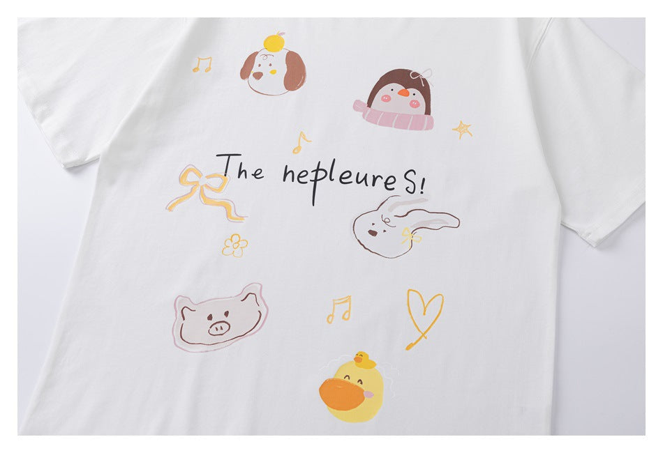 White short-sleeve T-shirt with playful pastel animal, bow, music note and heart graphics and black lettering.
