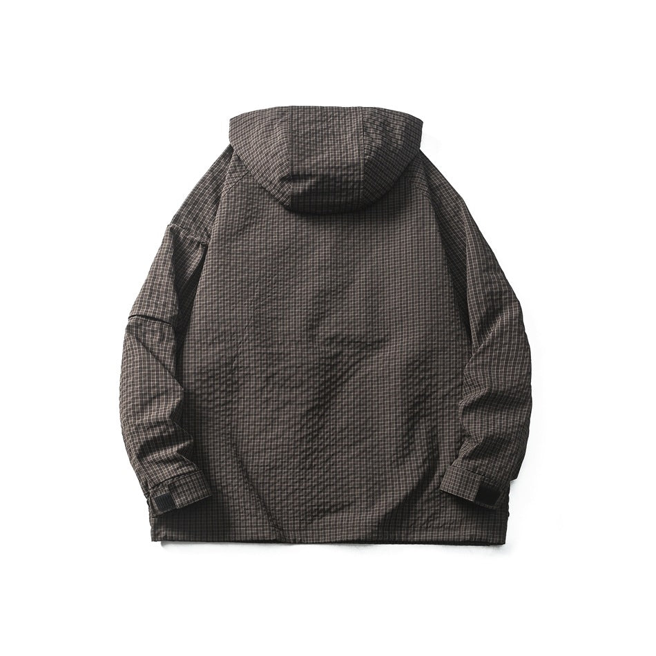 Back view of a dark brown fine-grid hooded pullover jacket with adjustable cuffs.