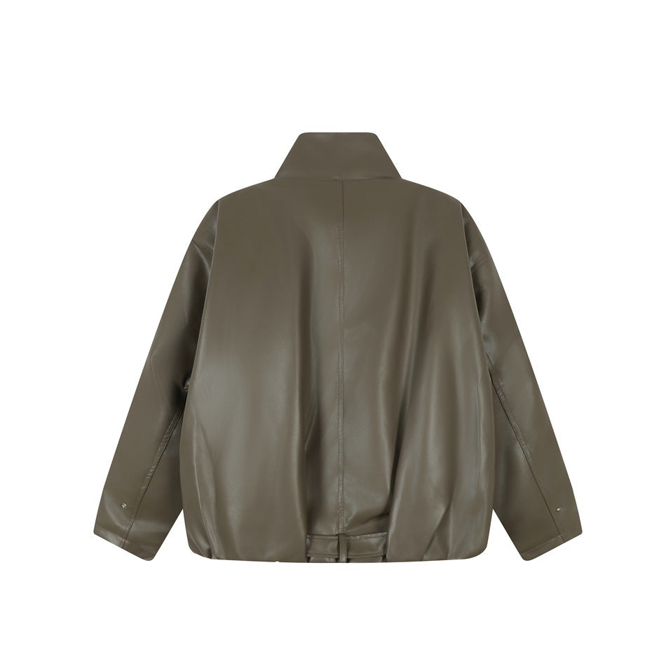 Back of an olive-gray jacket with a high collar, long sleeves, center seam, and adjustable hem tabs.