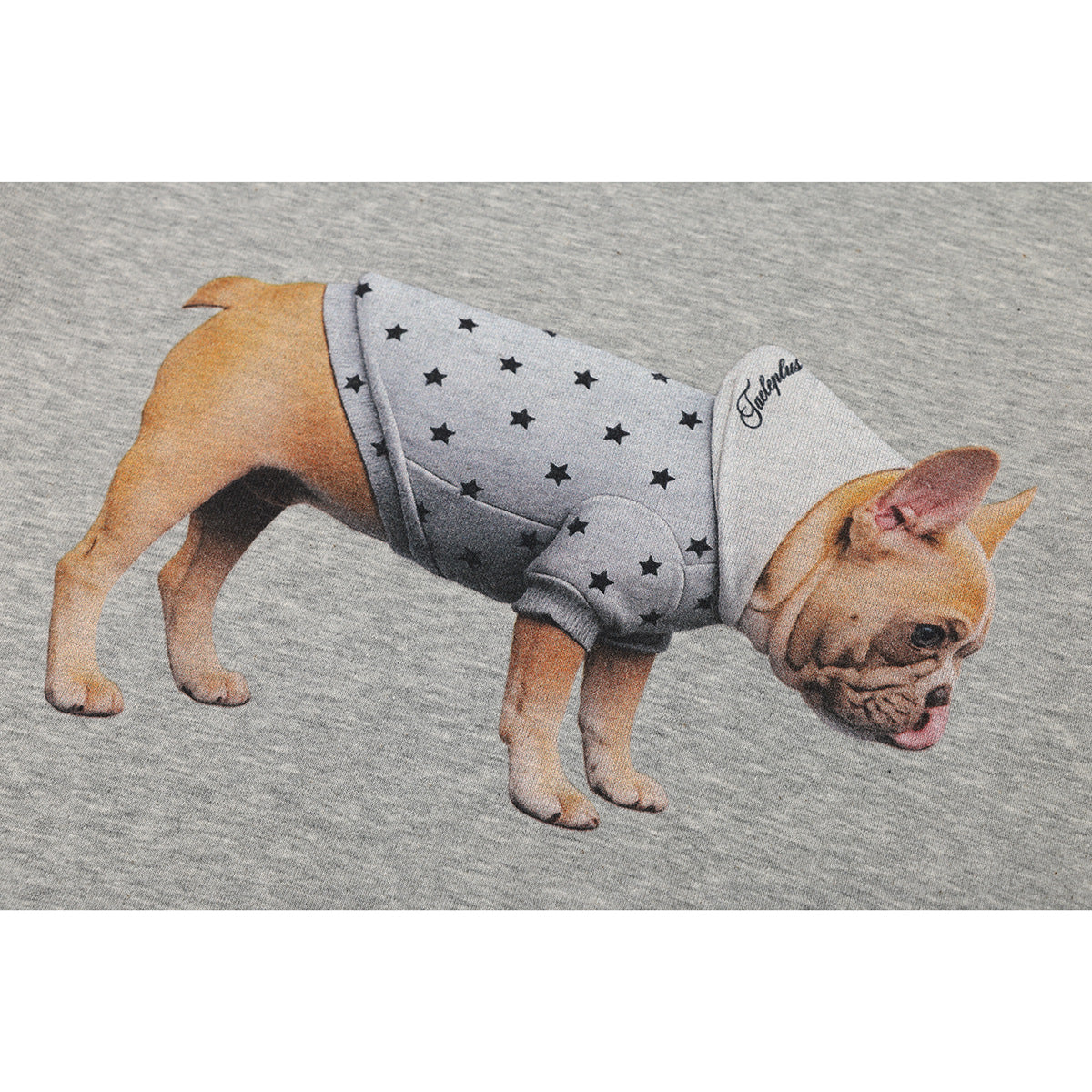 Close-up of a French bulldog graphic wearing a gray star-print hoodie on heather gray fabric.