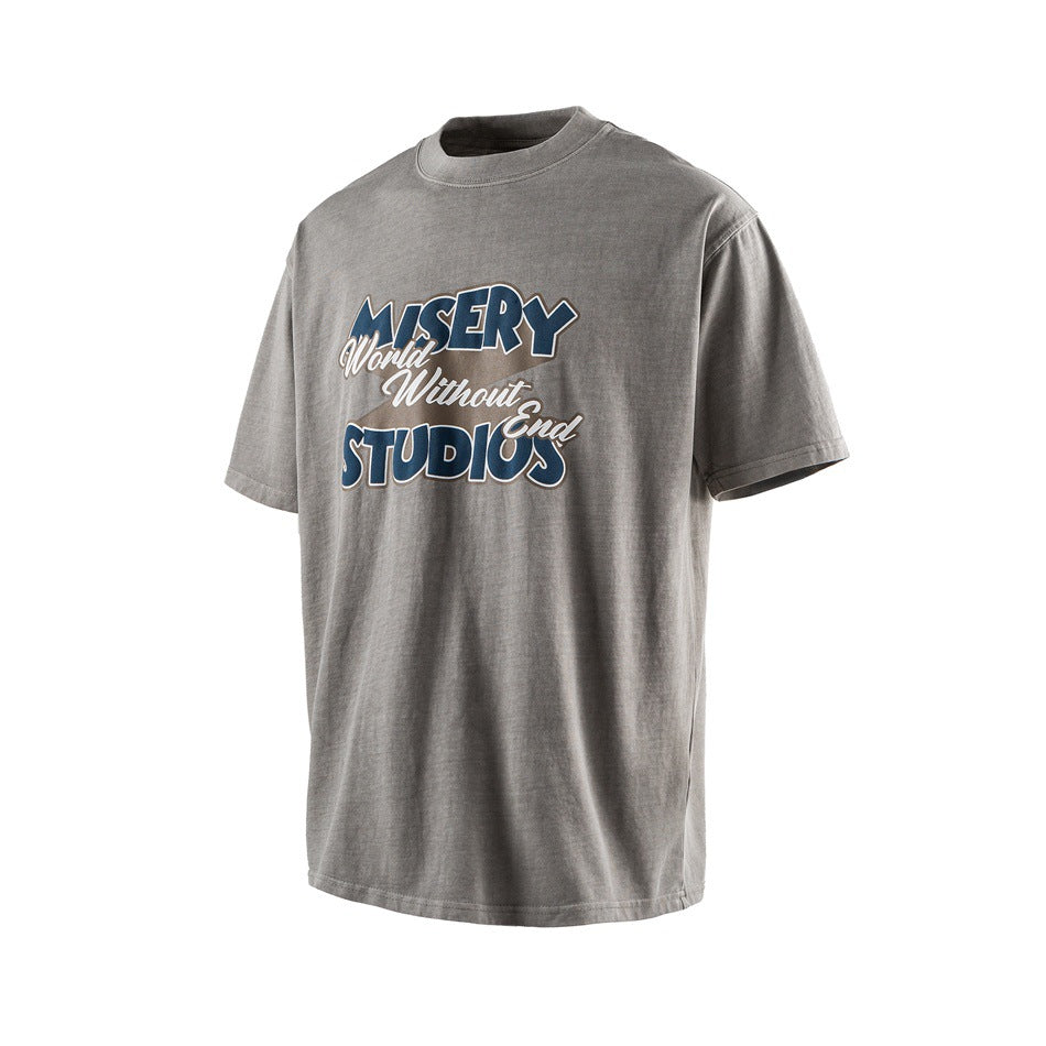 Gray short-sleeve crew-neck T-shirt with a large blue, white, and tan “Misery World Without End Studios” chest graphic.