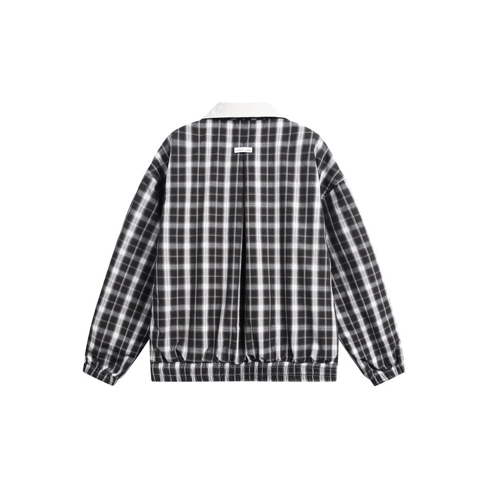 Back view of a black-and-white plaid zip jacket with a contrasting light collar and gathered hem.