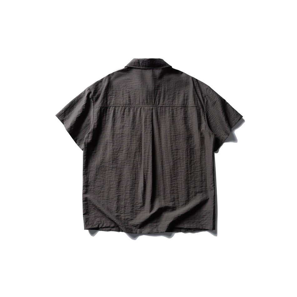 Dark gray short-sleeve textured shirt, flat lay back view with yoke seam and center pleat