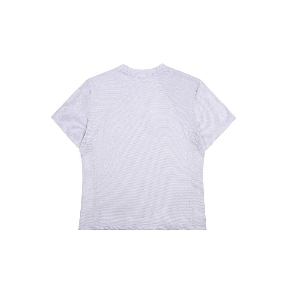Back view of a very pale lavender-gray short-sleeve crew-neck shirt with fine horizontal texture and curved seam panels.
