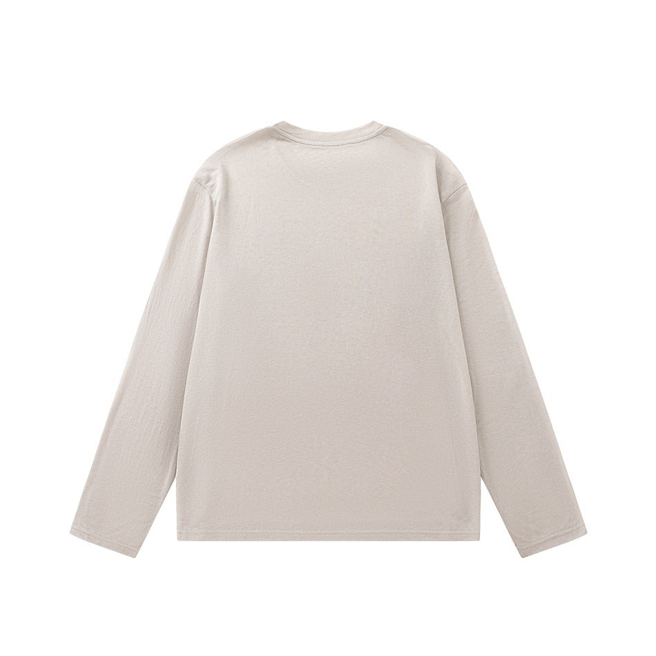 Back view of a plain light beige-pink long-sleeve crew-neck tee with dropped shoulders, flat lay