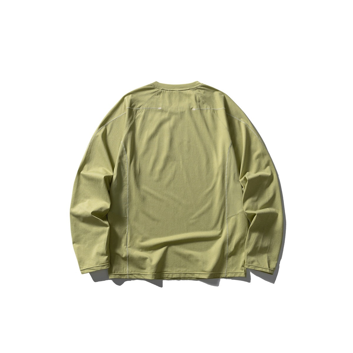 Back view of a pale olive long-sleeve crewneck shirt with curved panel seams and small horizontal details near the shoulders.