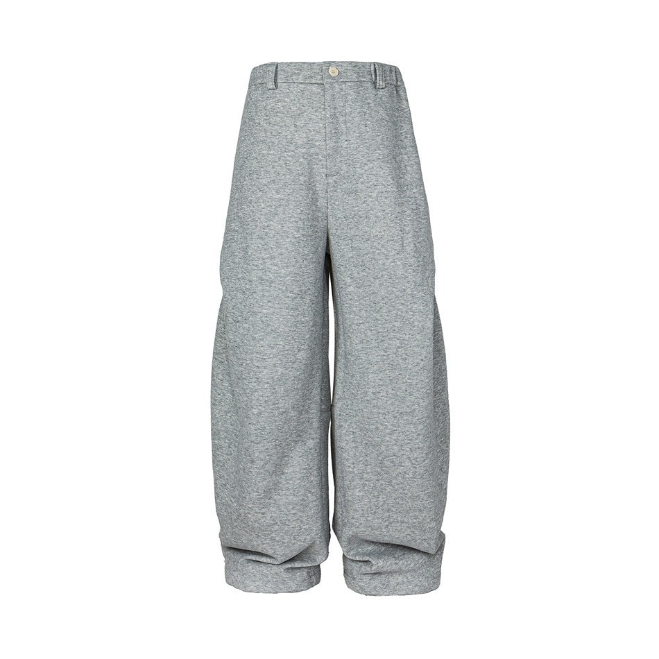 Front view of heather-gray wide-leg trousers with a button waistband and folded cuffs.