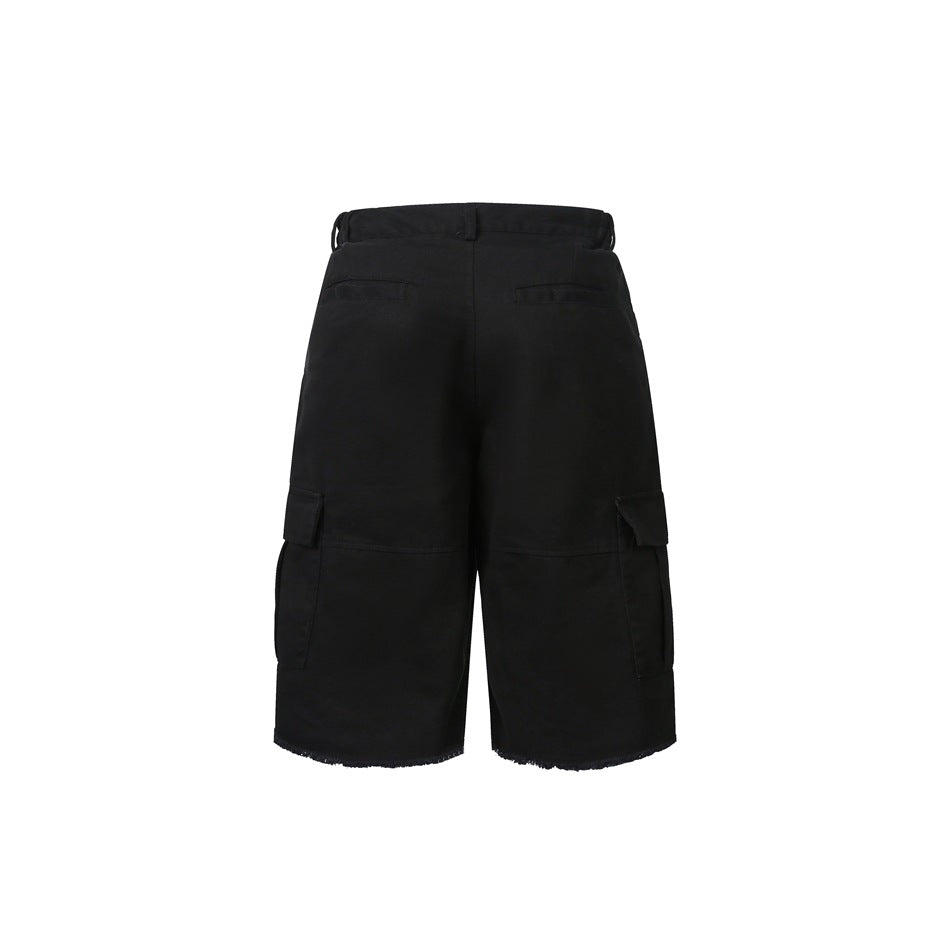 Back view of black knee-length cargo shorts with two rear welt pockets, side cargo pockets and frayed hems.
