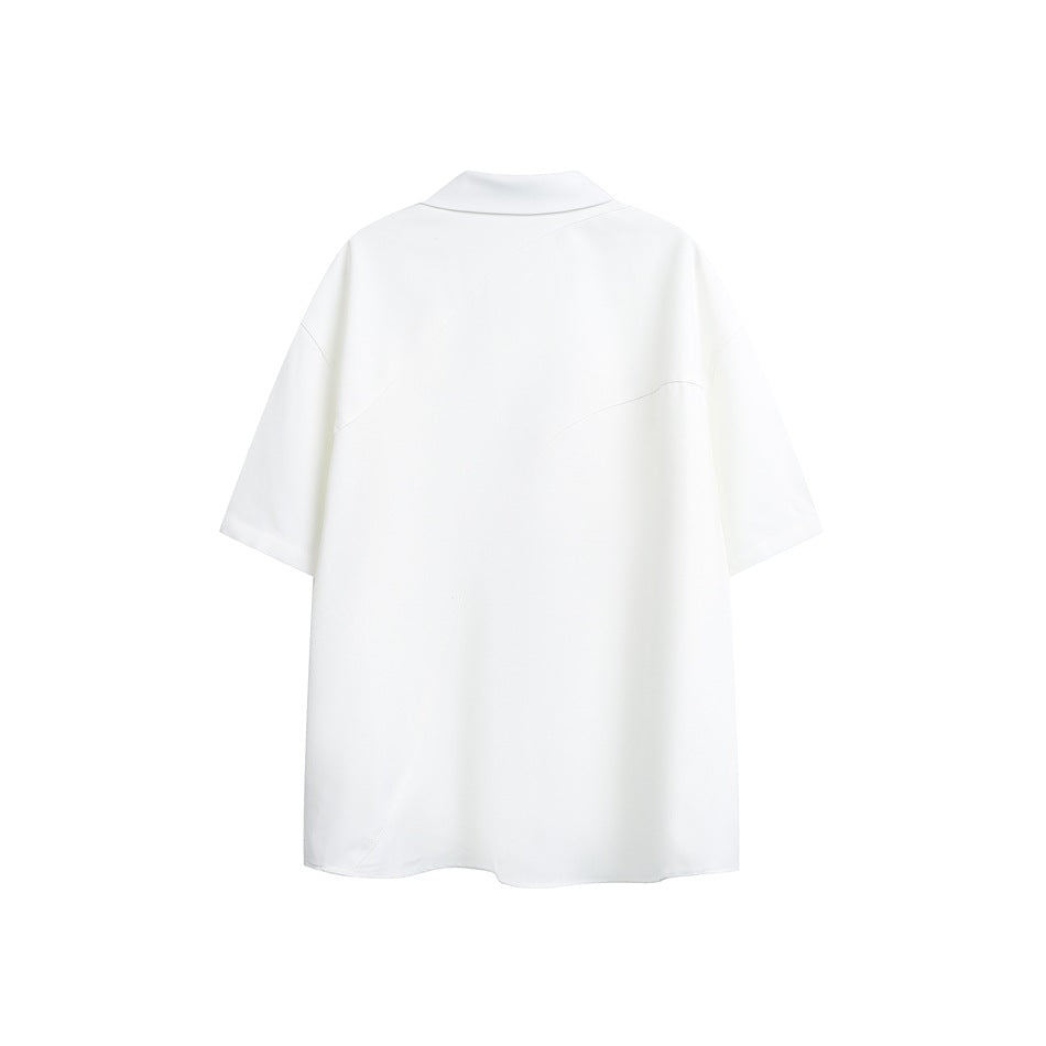 Back view of a white short-sleeve shirt with a pointed collar and curved panel seams.