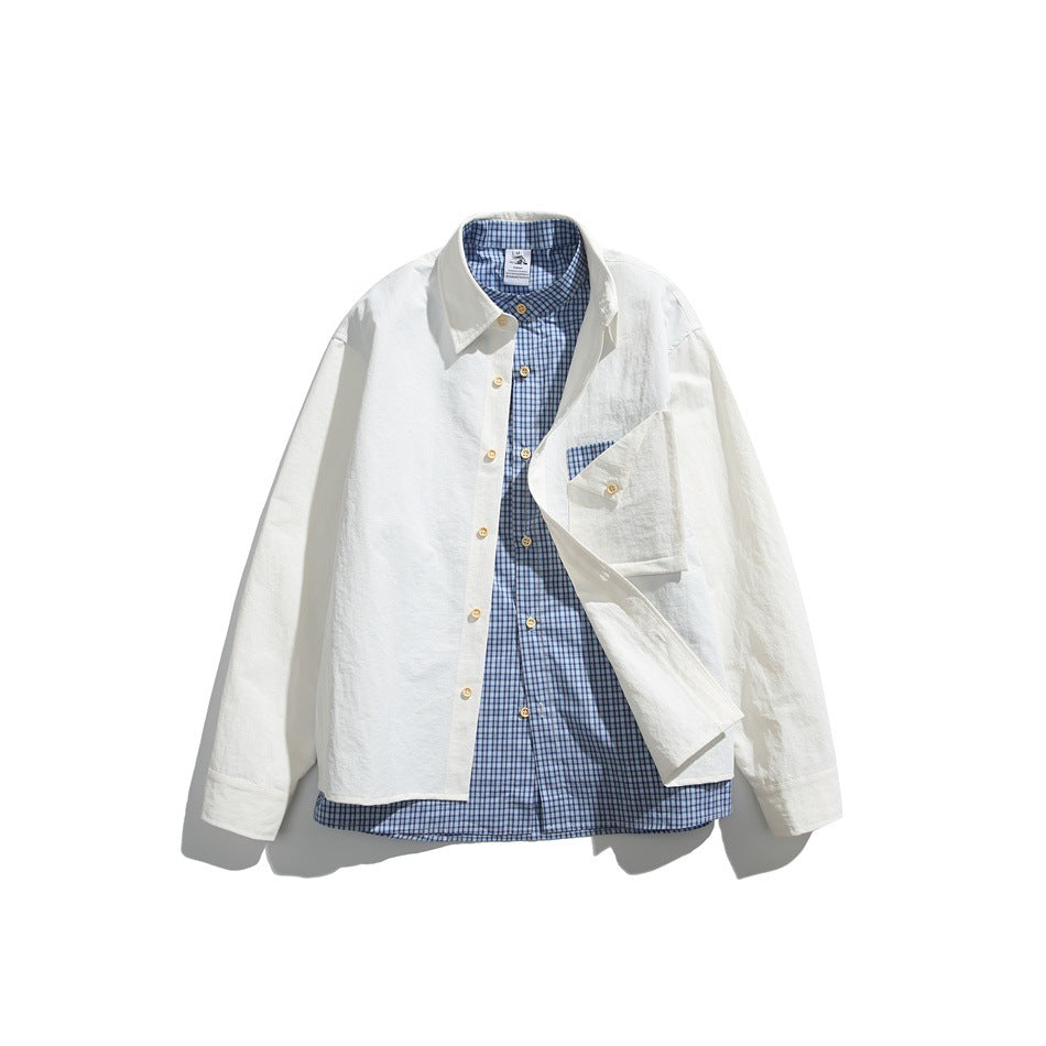 White long-sleeve shirt worn open over a blue gingham underlayer, flat lay with flap chest pocket