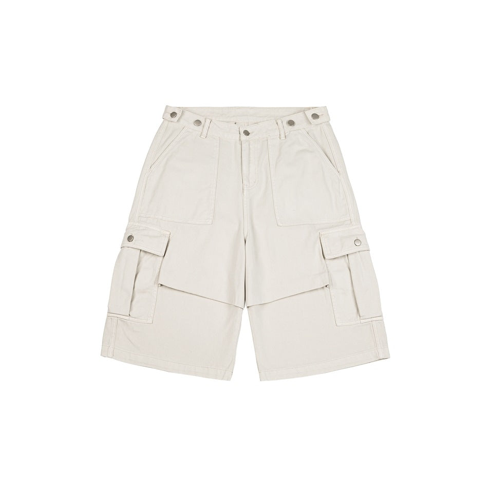 Off-white knee-length cargo shorts, front flat lay, with flap cargo pockets and snap waist tabs