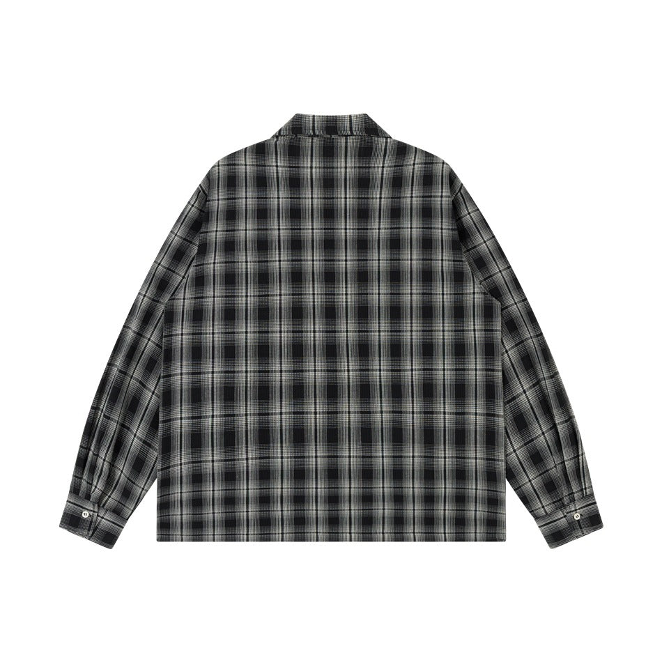 Back view of black and gray plaid long-sleeve shirt with button cuffs, flat lay