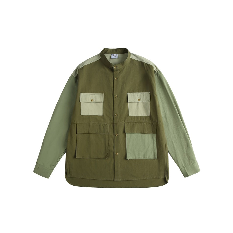 Green color-block stand-collar button shirt with flap chest pockets and large patch pockets, flat front view