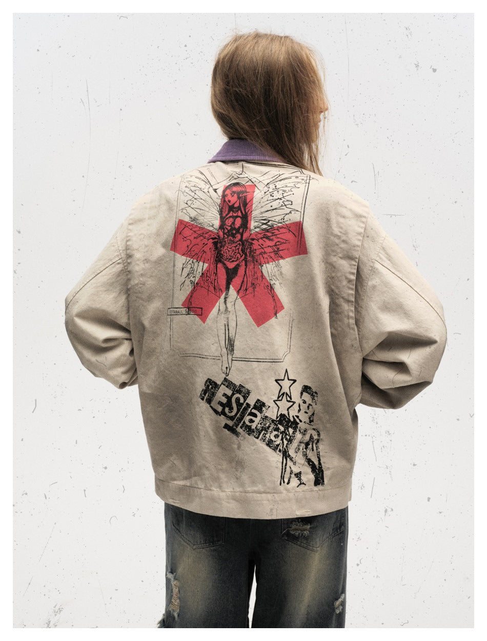 Back view of a model wearing a beige jacket with a large red-and-black graphic and distressed lettering.