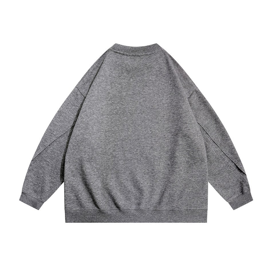 Back view of dark gray crew-neck sweatshirt with ribbed cuffs and hem and diagonal sleeve seams
