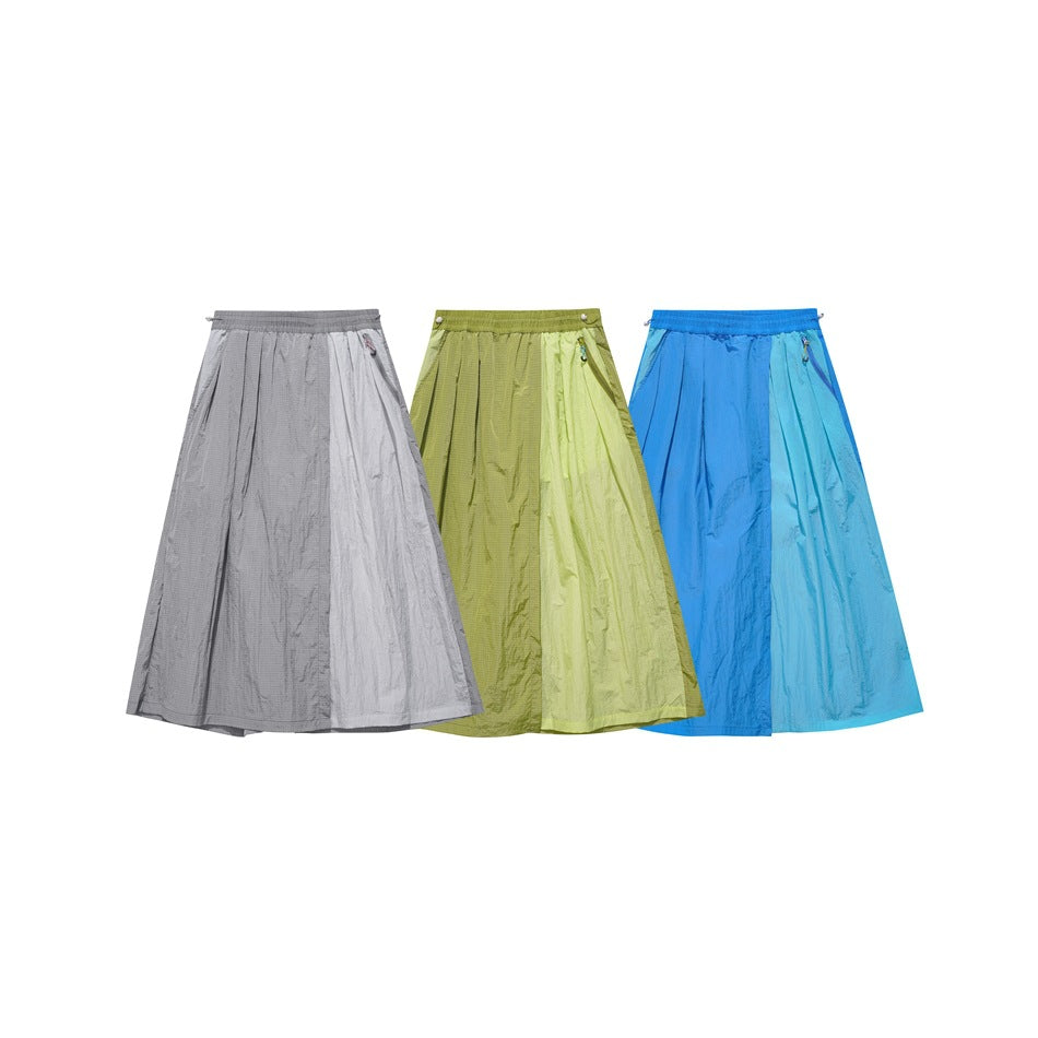 Three pairs of flowing wide-leg bottoms shown in gray, yellow-green and bright blue.