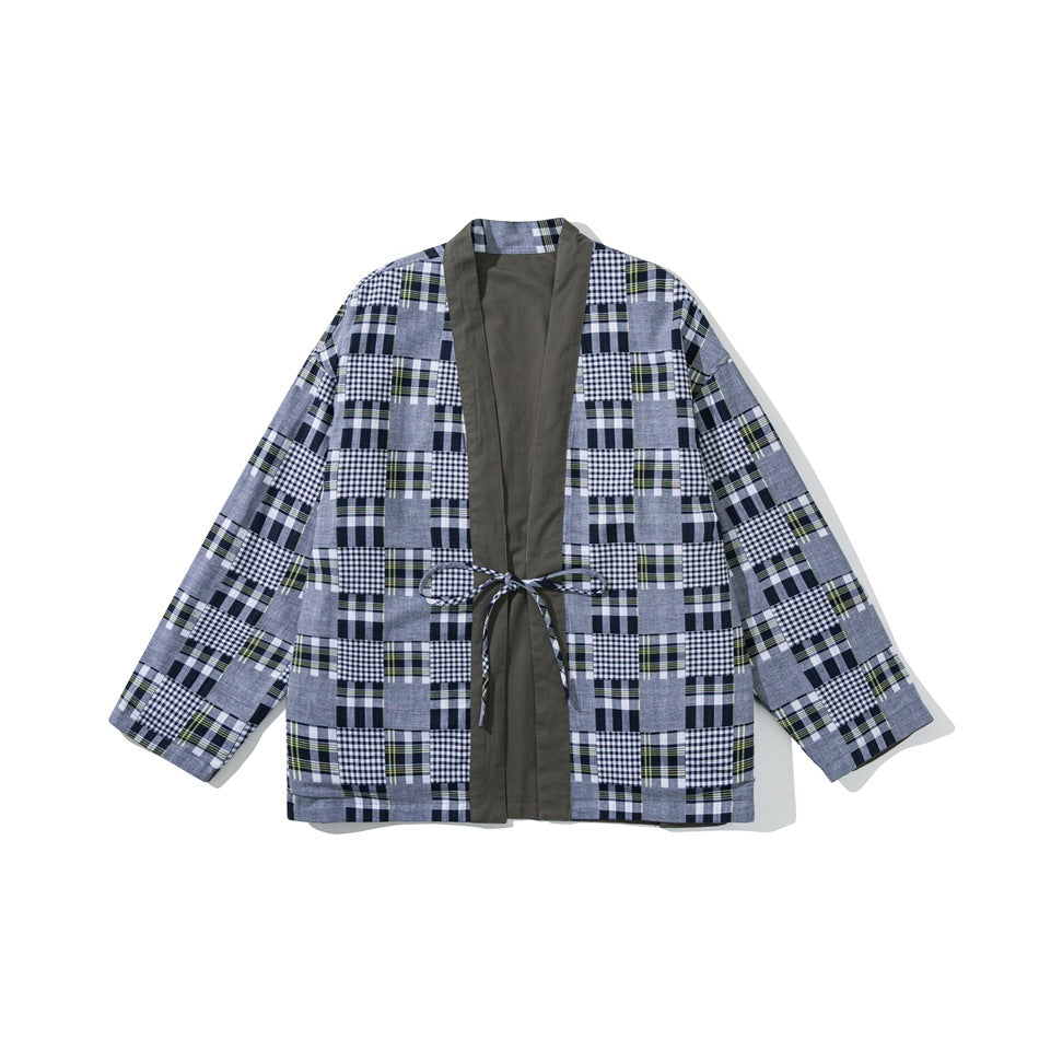 Front view of an open-front jacket with gray plaid panels, olive lapels, and a matching waist tie.
