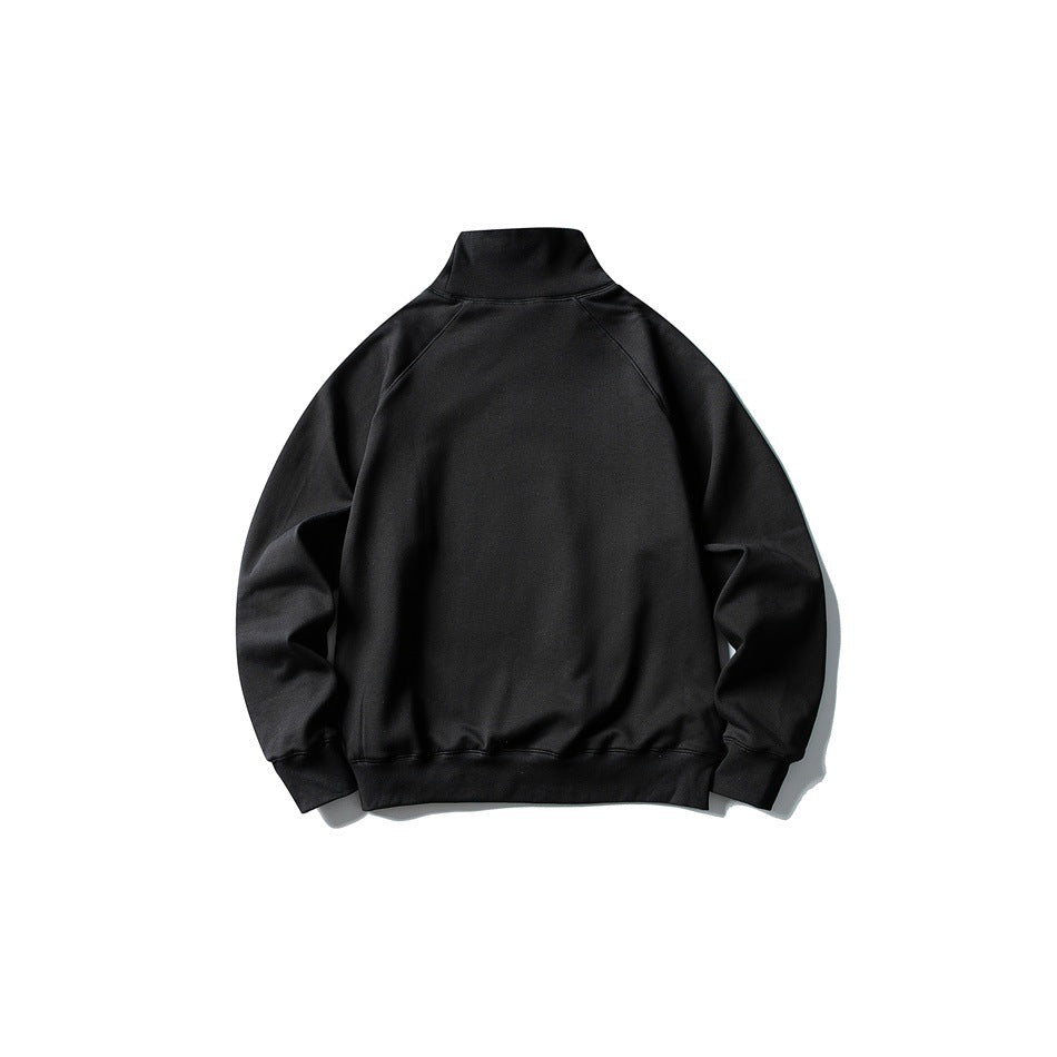 Black high-neck raglan-sleeve sweatshirt flat lay, back view, plain back with ribbed cuffs and hem